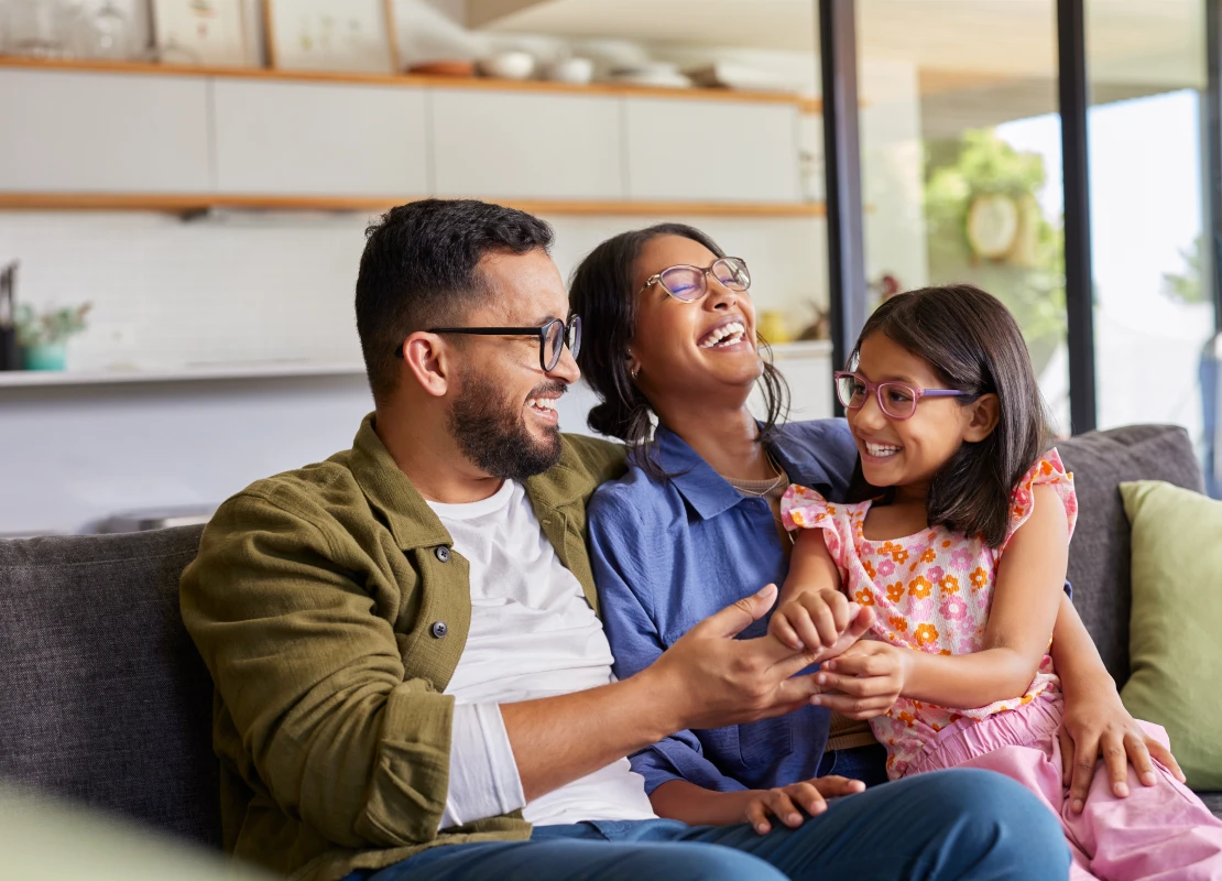 family sitting on a couch