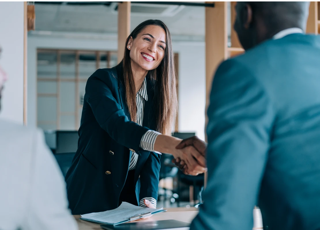 agent shake hand with client